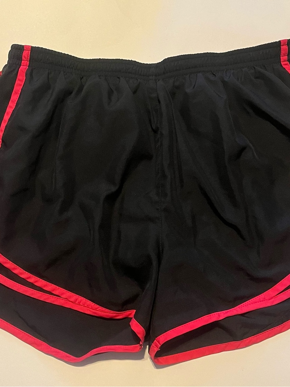 Nike Women's Black Athletic Shorts with Pink Trim